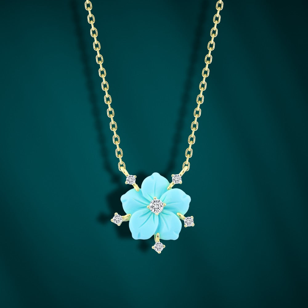 عقد زهرة الربيع الذهبي – تصميم أنثوي بحجر فيروز متألق وسلسلة بلون ذهبي