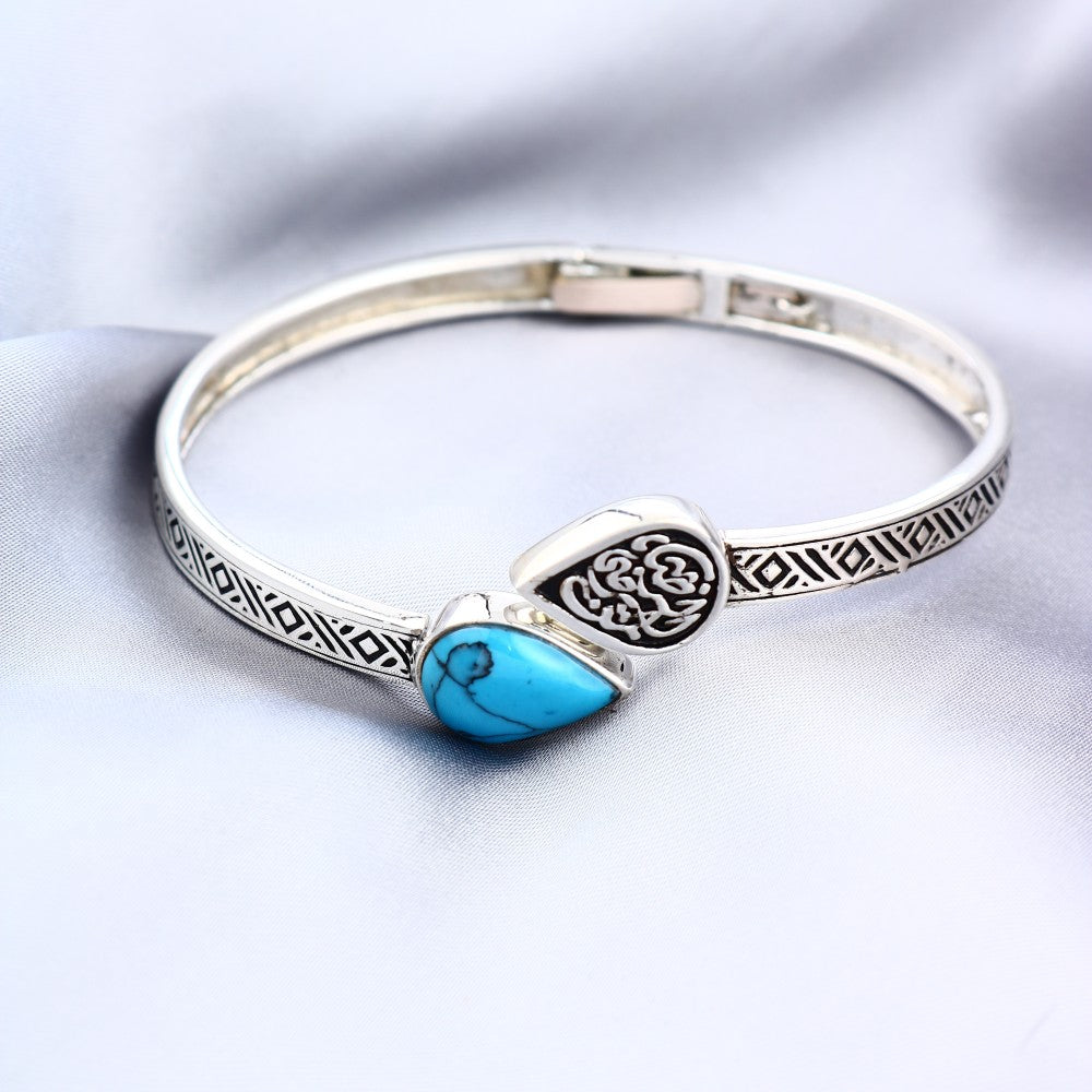 إسوارة فضة عيار 925 منقوش عليها عبارة "الرضا لمن يرضى" بحجر فيروزي طبيعي