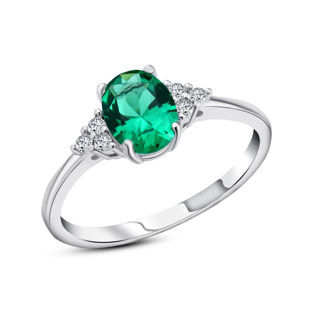 خاتم لمسة الزمرد – فضة عيار 925 بحجر طبيعي أخضر وقاعدة مرصعة بفصوص لامعة