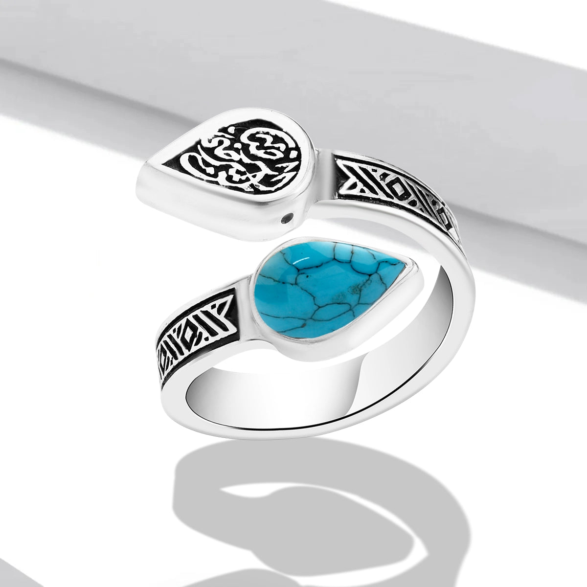 خاتم فضة مصري حريمي عيار 925 بتصميم مفتوح مزين بحجر فيروزي ونقش عربي