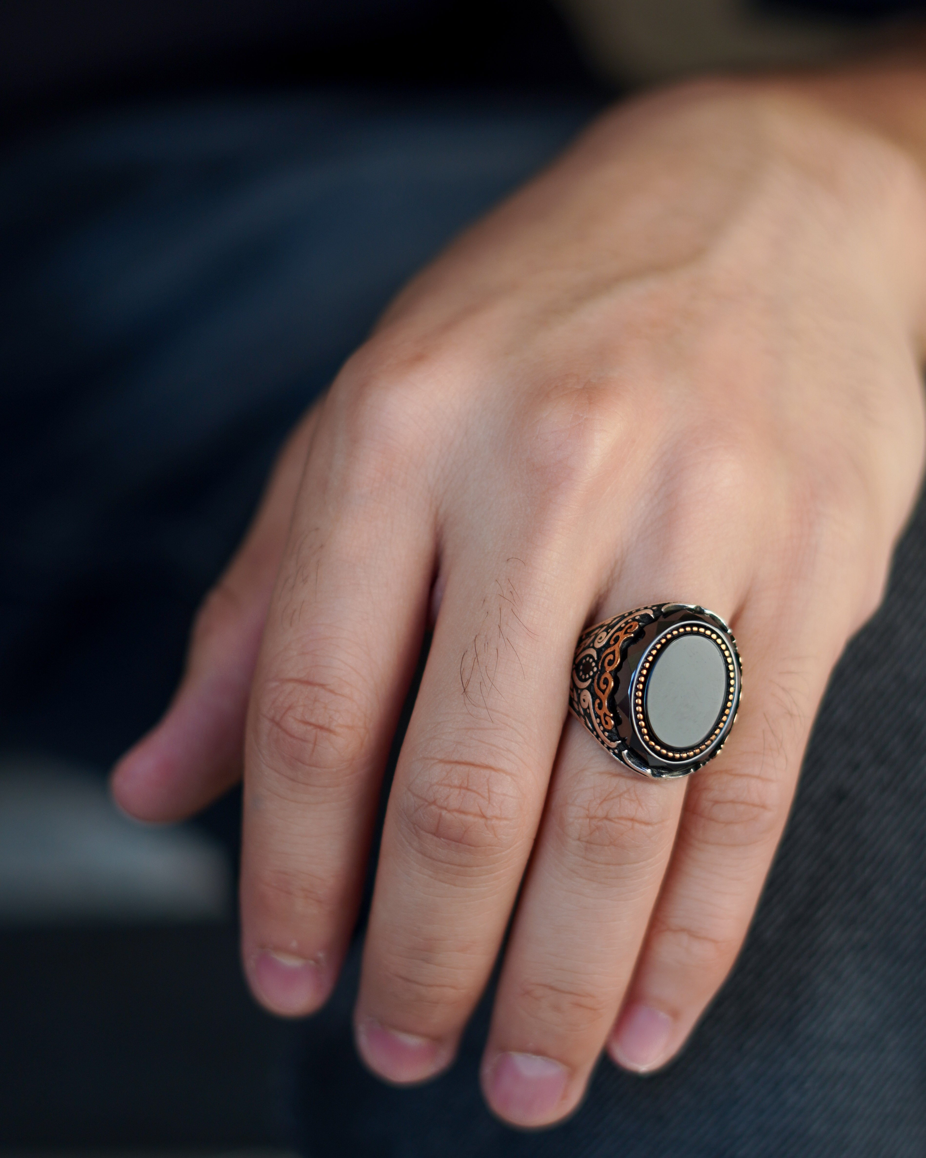 Men’s Silver Ring with Black Onyx and Oriental Gold Detailing