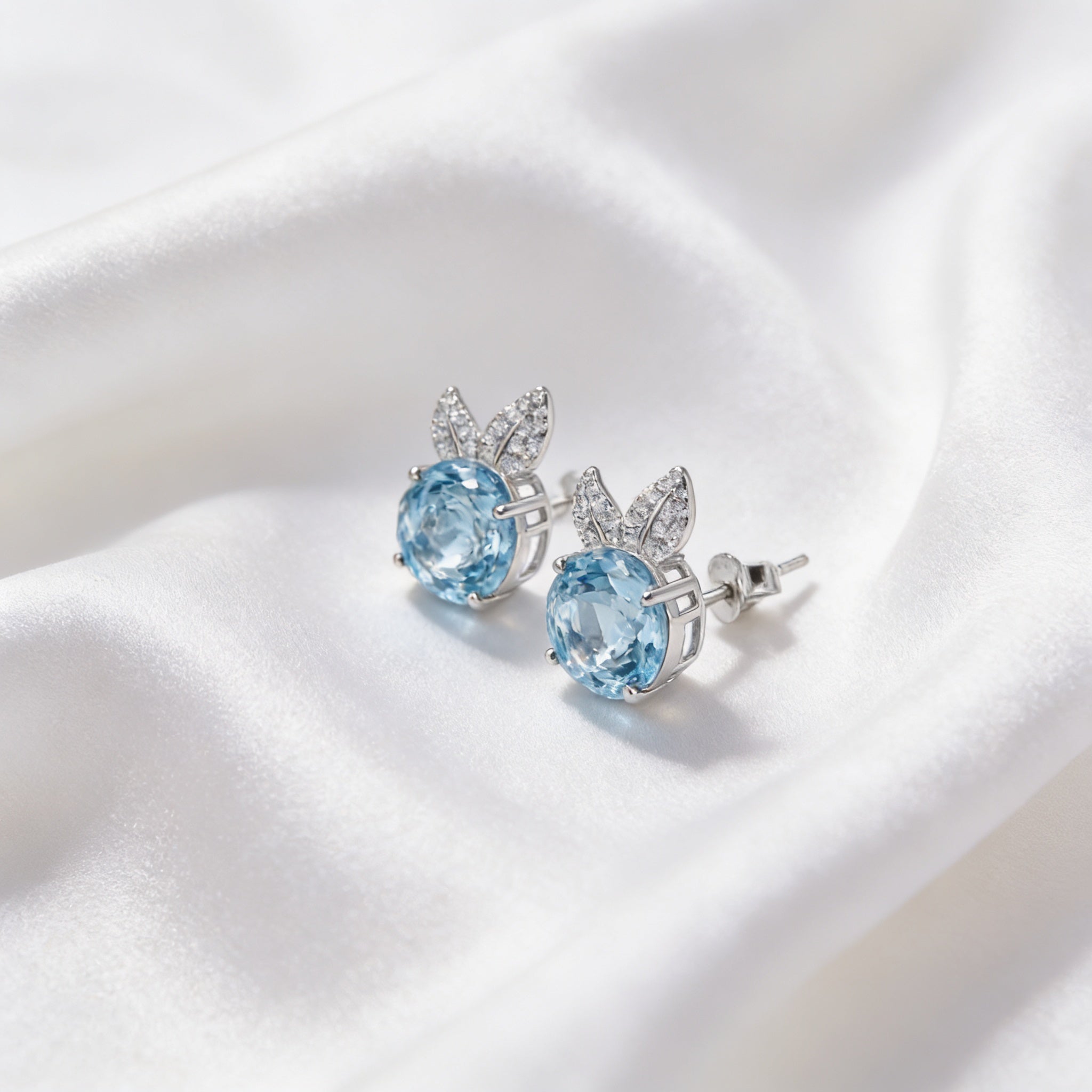 Blue Flower Stud Earrings with Sparkling Leaf Details – 925 Silver