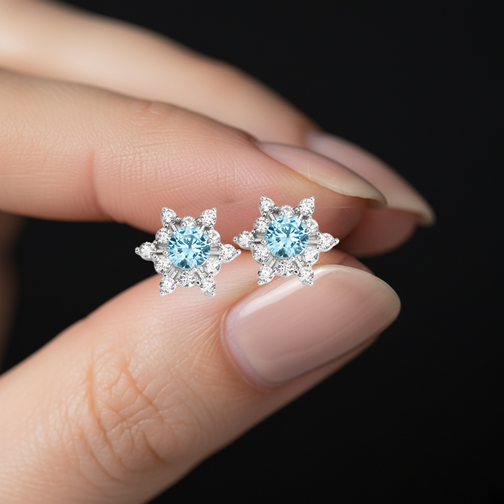 Snowflake Stud Earrings with Light Blue Stone – 925 Silver