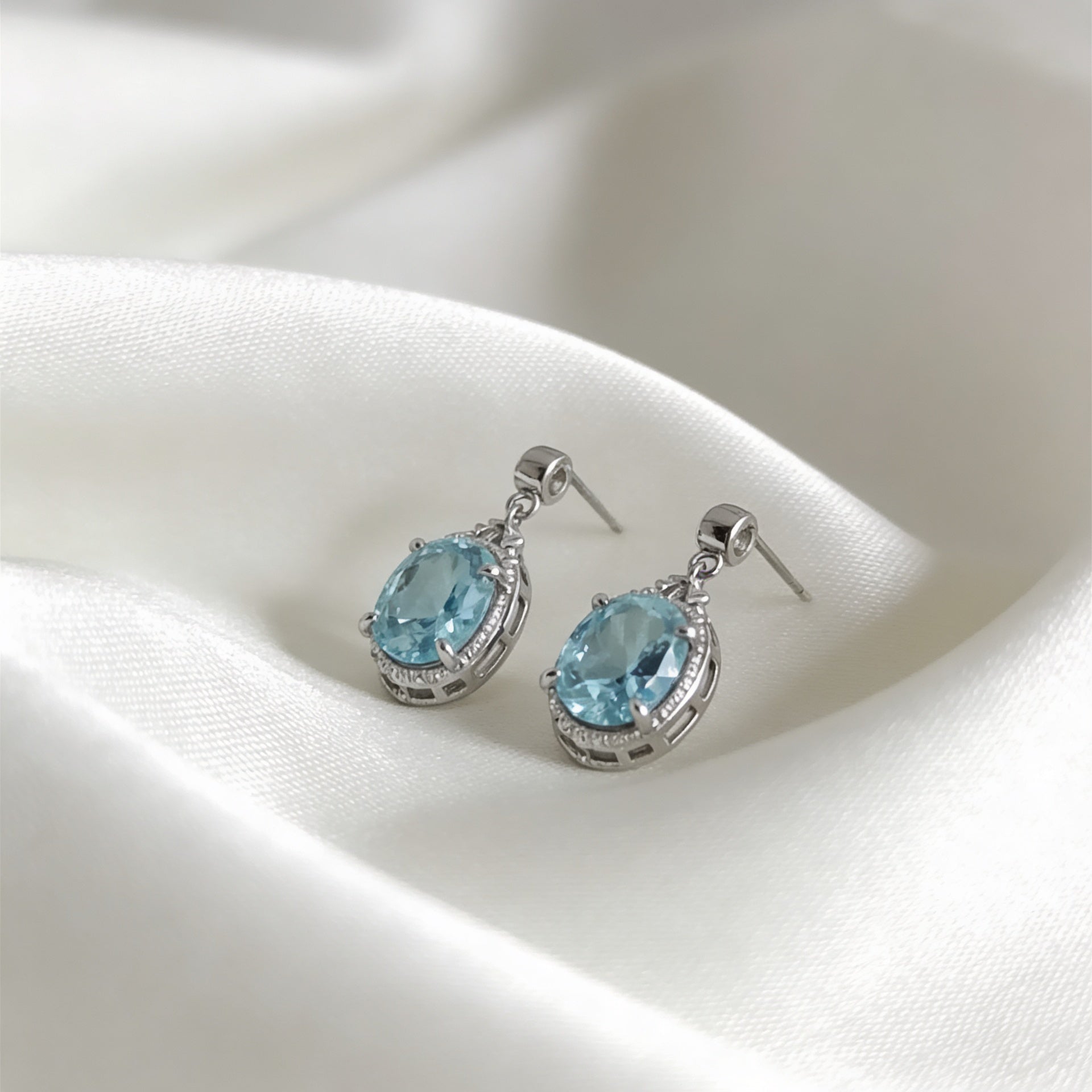 Elegant Screw-Back Earrings with a Light Blue Oval Ice-Crushed Stone, 925 Silver