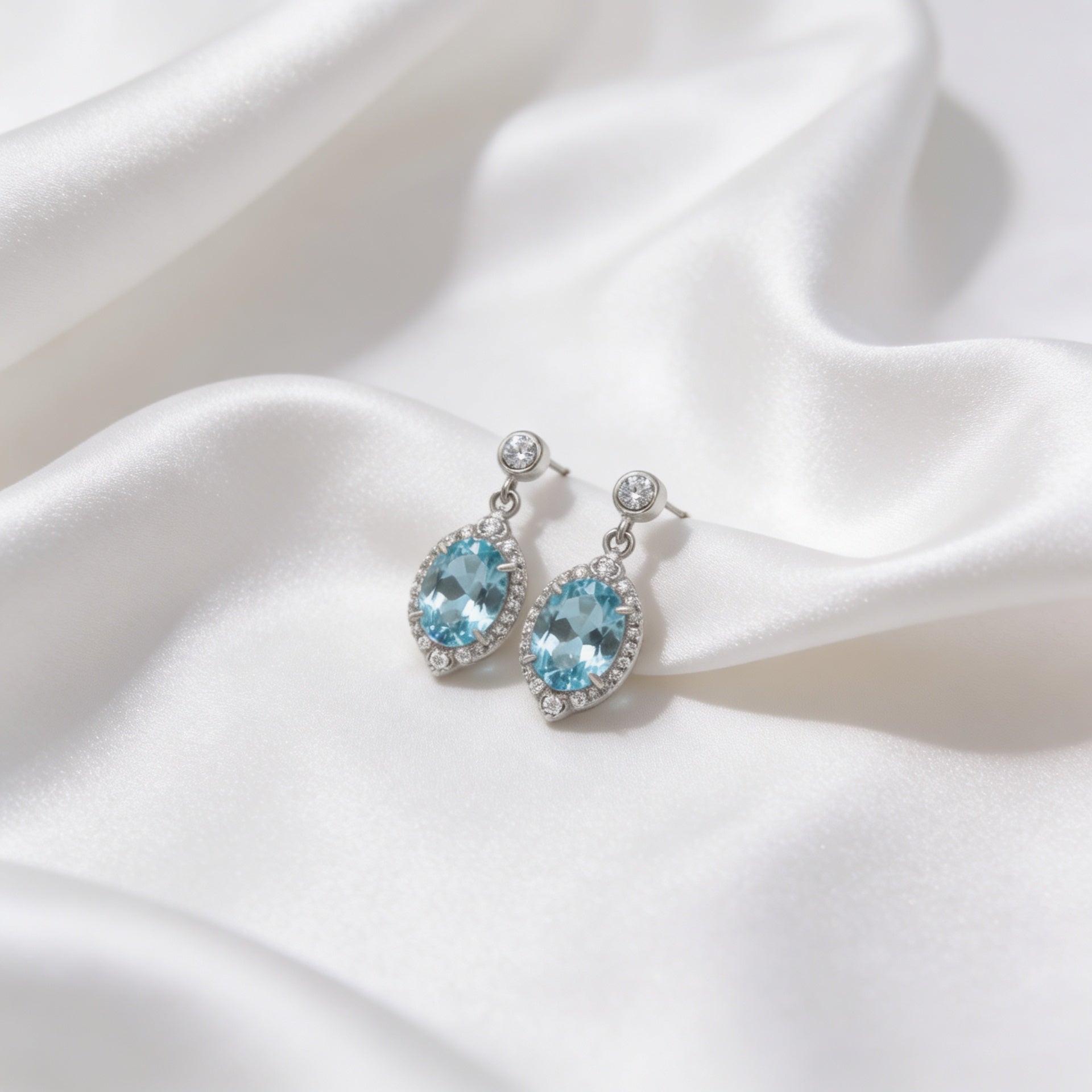 Elegant Screw-Back Earrings with a Light Blue Oval Ice-Crushed Stone, 925 Silver