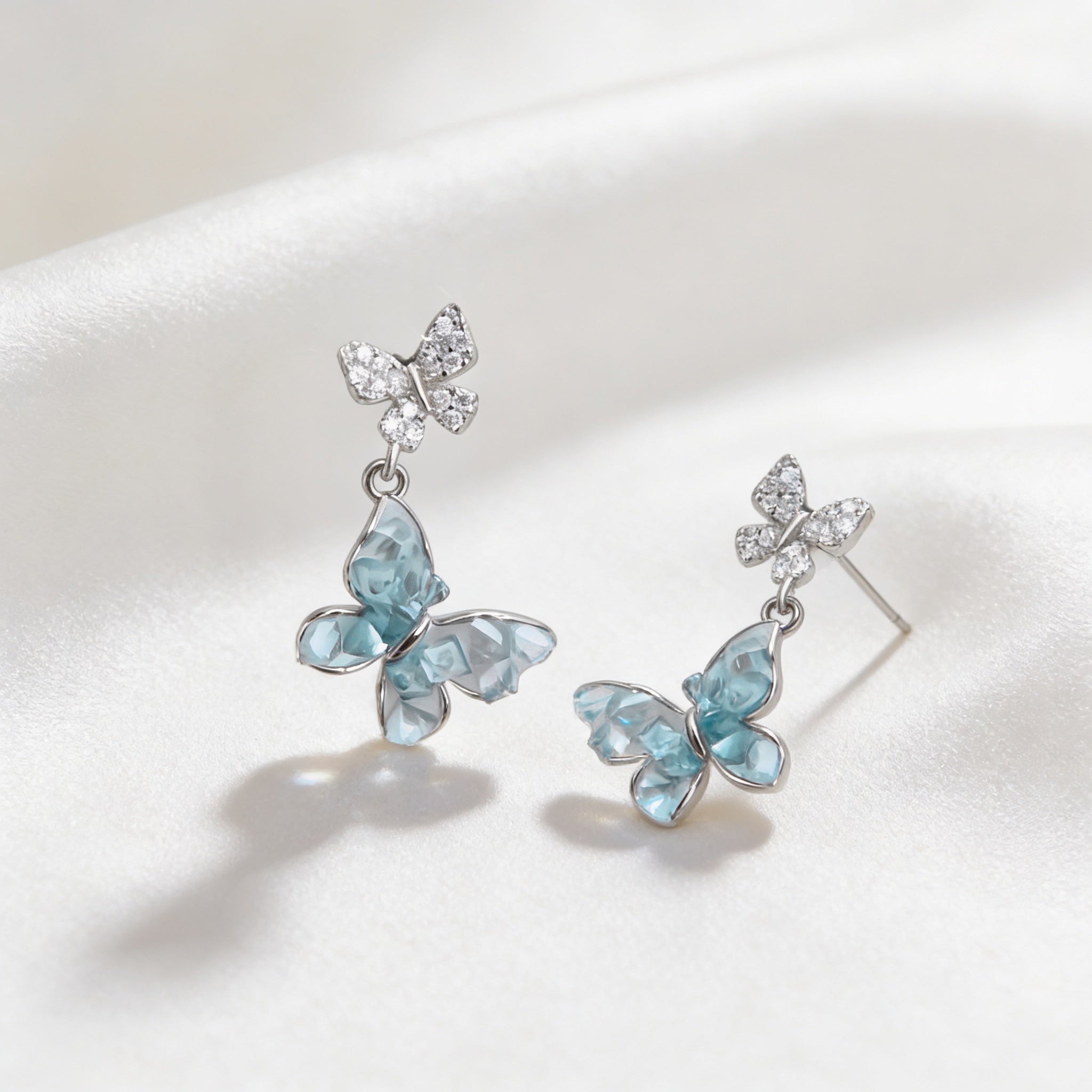 Elegant Light Blue Dangling Butterfly Stud Earrings – 925 Silver