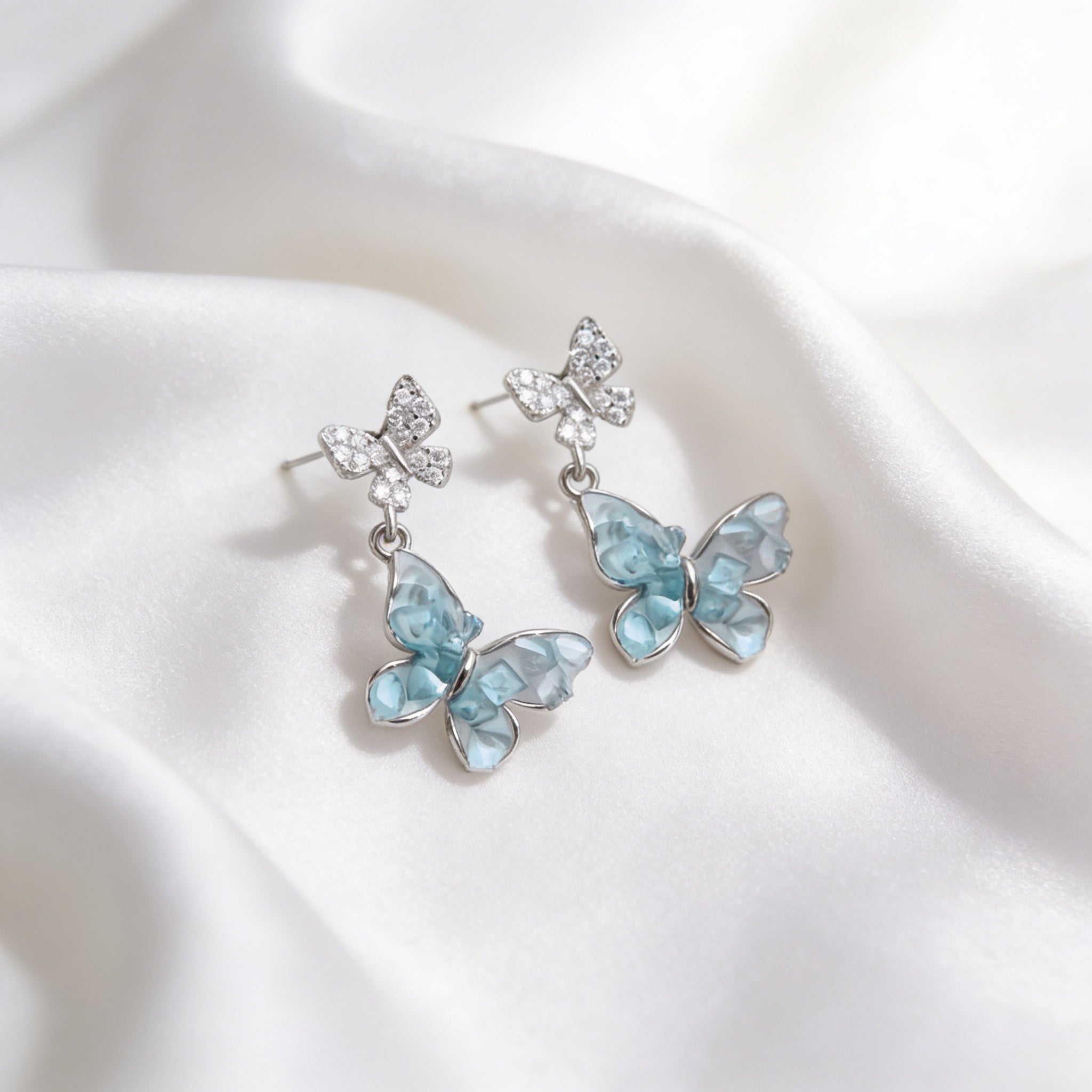 Elegant Light Blue Dangling Butterfly Stud Earrings – 925 Silver