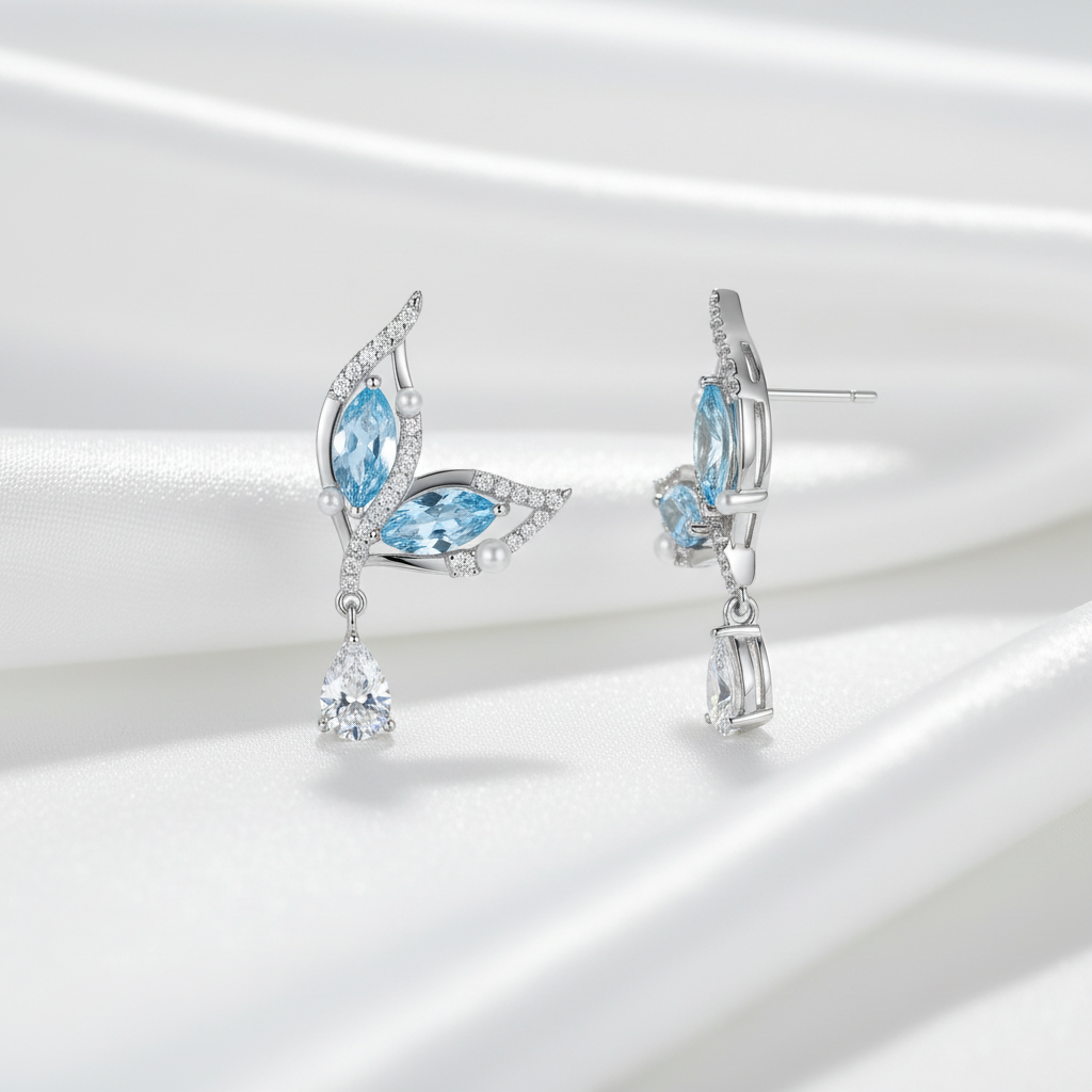 Delicate Stud Earrings with Light Blue Stone and Sparkling Stones – 925 Silver