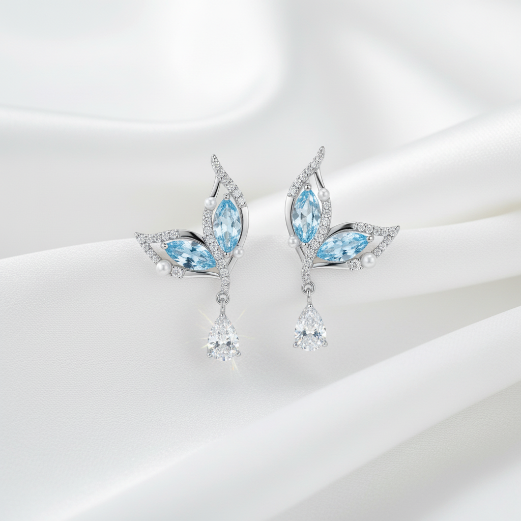 Delicate Stud Earrings with Light Blue Stone and Sparkling Stones – 925 Silver