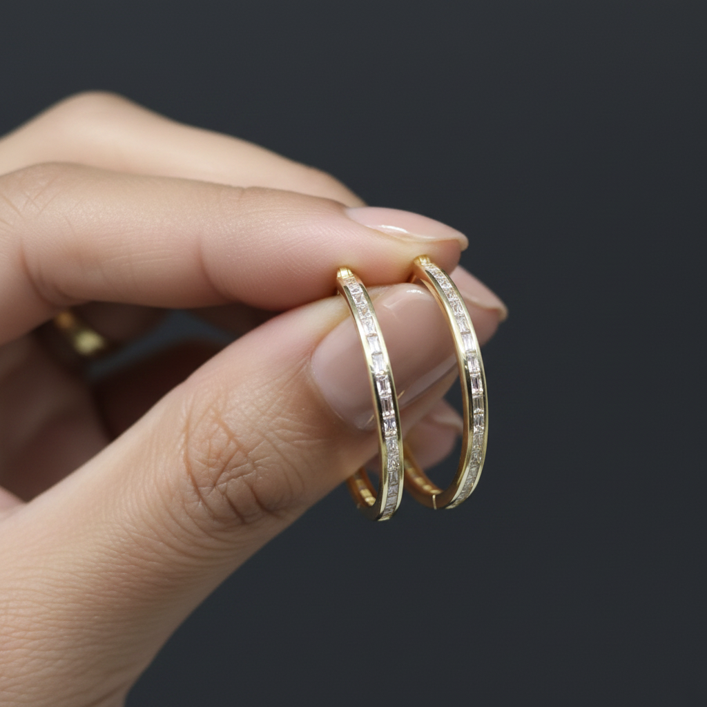 Circular clip-on earrings set with rectangular zircon stones, gold-plated over 925 silver.