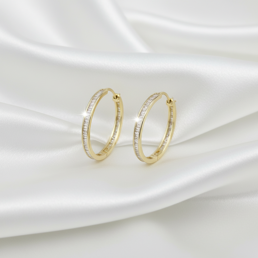 Circular clip-on earrings set with rectangular zircon stones, gold-plated over 925 silver.