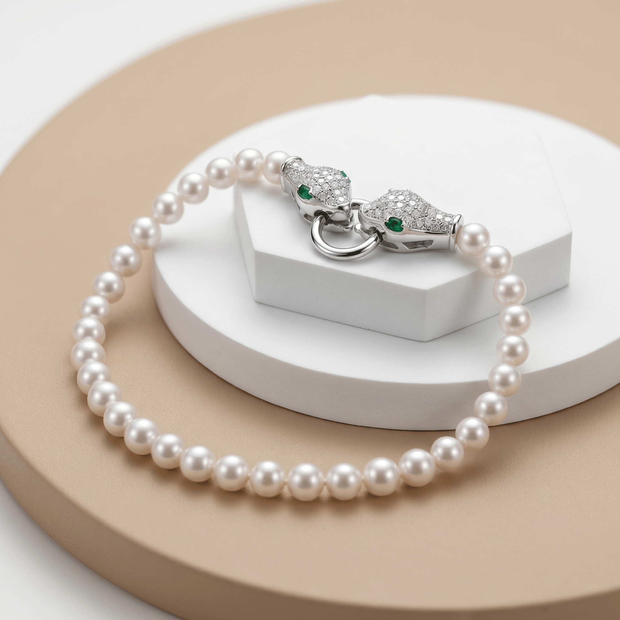 925 silver pearl bracelet with a snake design adorned with sparkling stones.