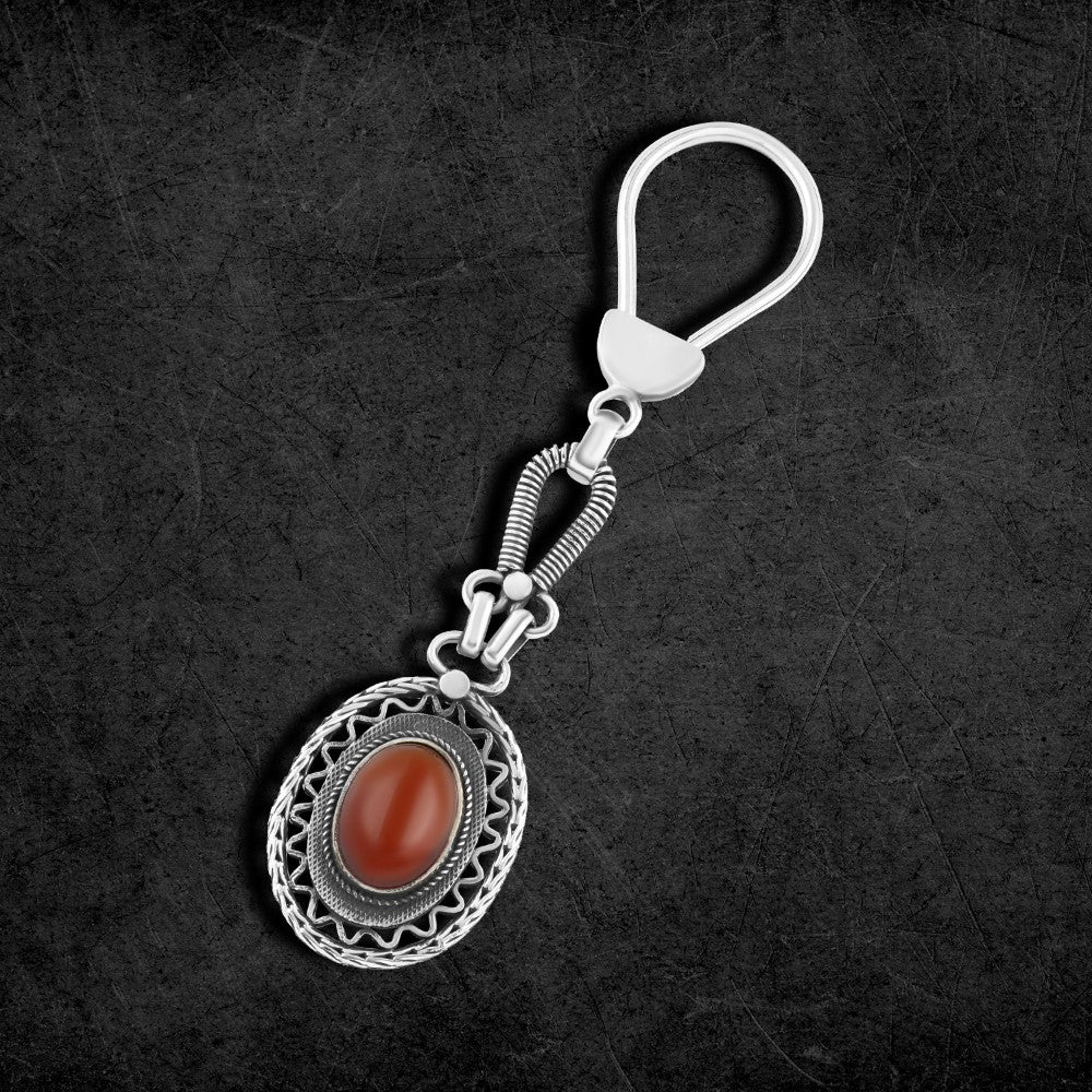 Oval-shaped Egyptian silver keychain with an Arabic design