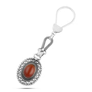 Oval-shaped Egyptian silver keychain with an Arabic design