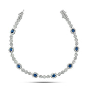 An elegant bracelet adorned with oval blue stones, crafted from 925 silver.