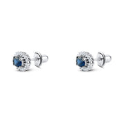 Spiral hoop earring with a round blue stone surrounded by 925 silver 