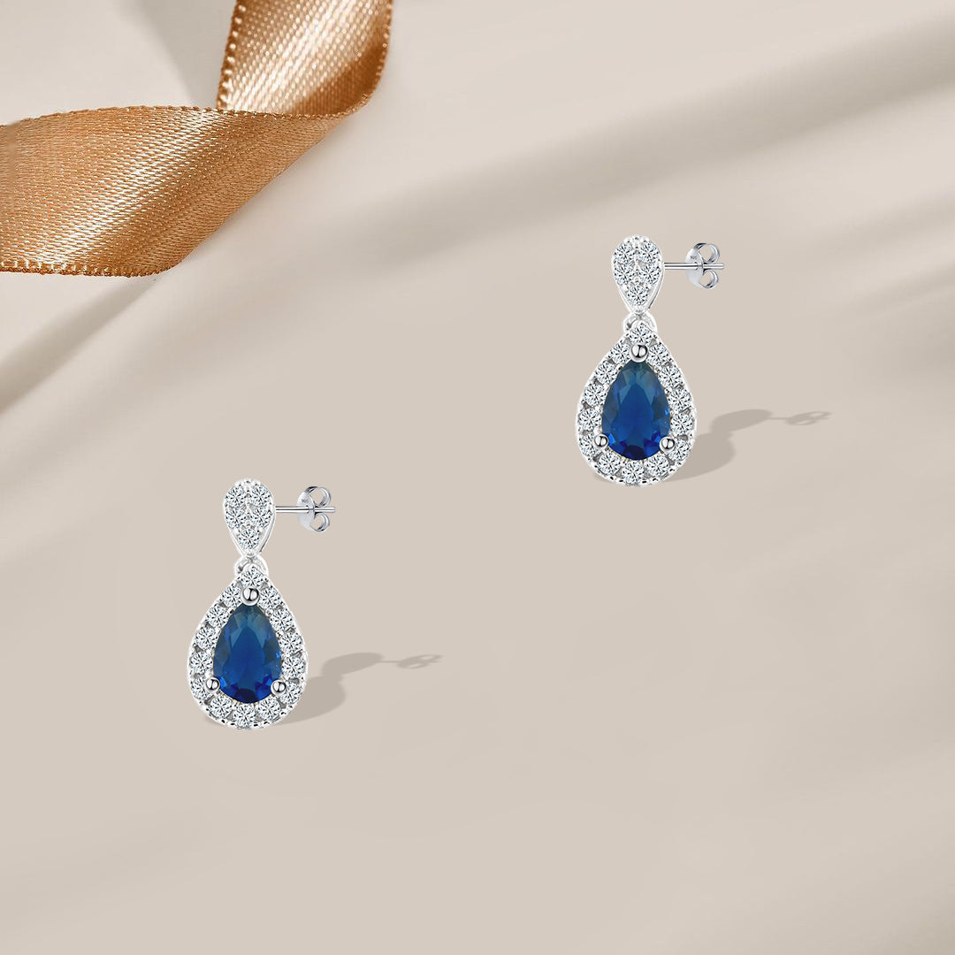 حلق فضة عيار 925 بفص زركون أزرق تصميم دمعة