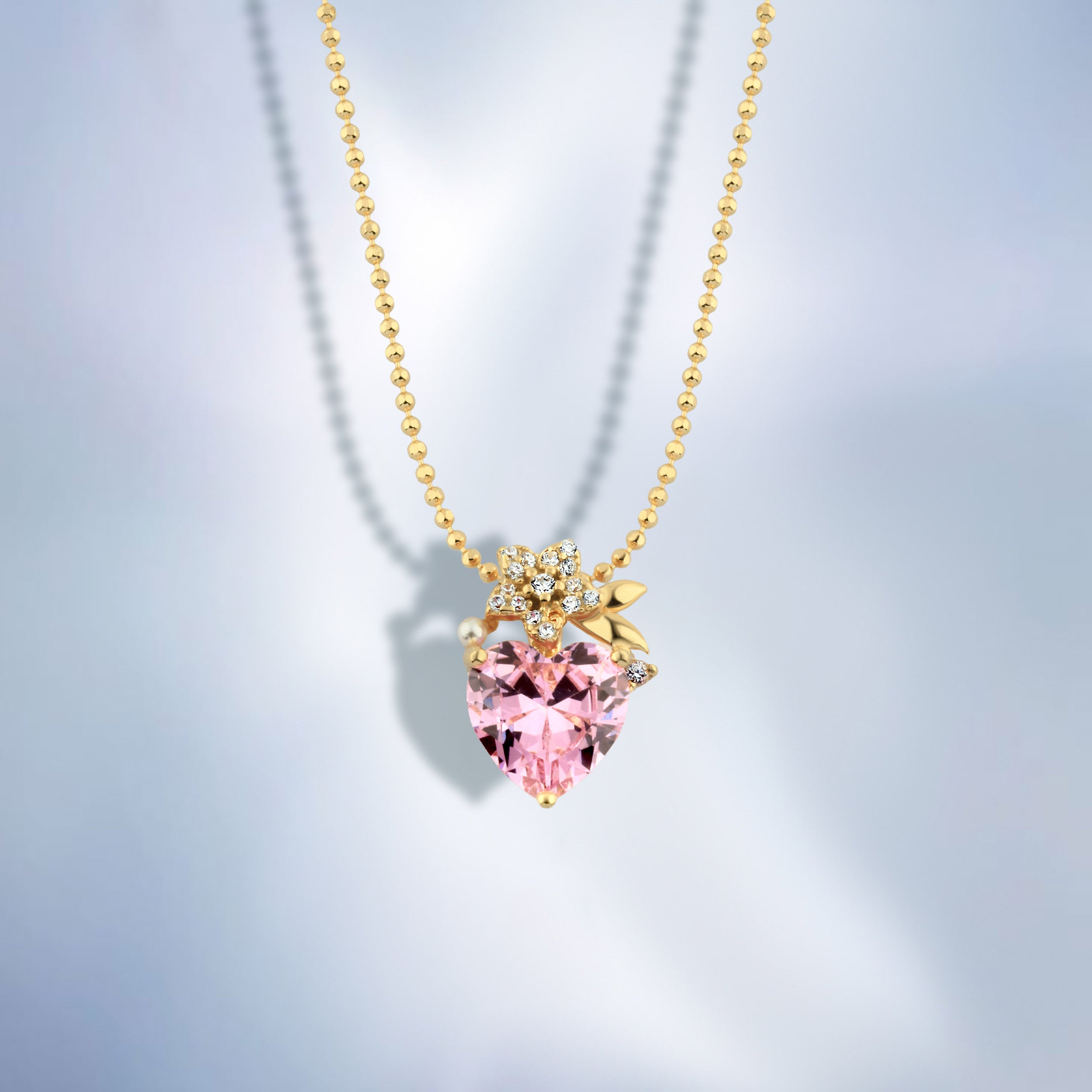 عقد "قلب وردي مرصع مع زهرة لامعة" فضة عيار 925 - مطلي ذهب