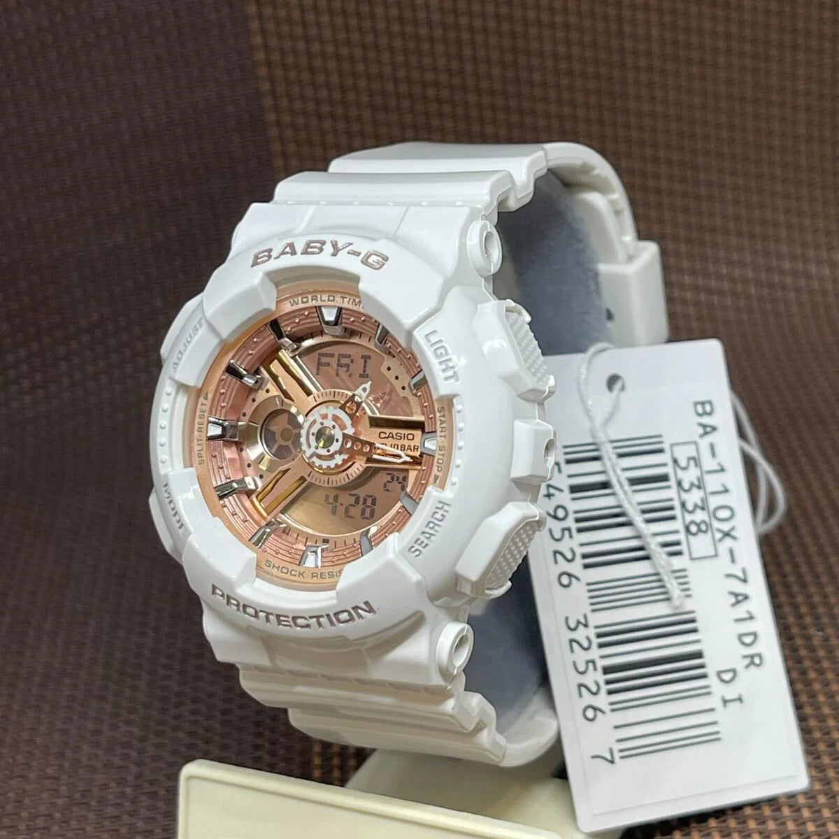 Casio Baby-G Analog-Digital Women's Wristwatch with White Resin Strap and Rose Gold Accents