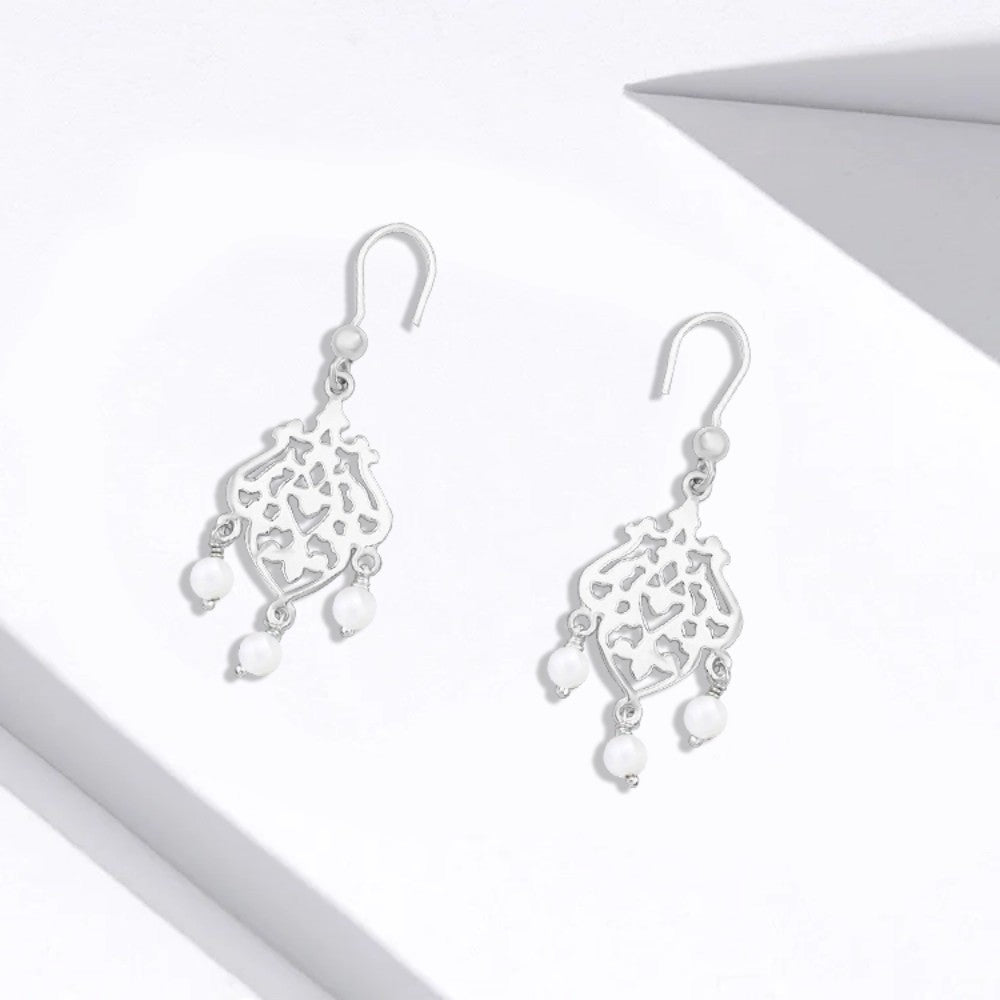 Silver hoop with an Arabic hollow design
