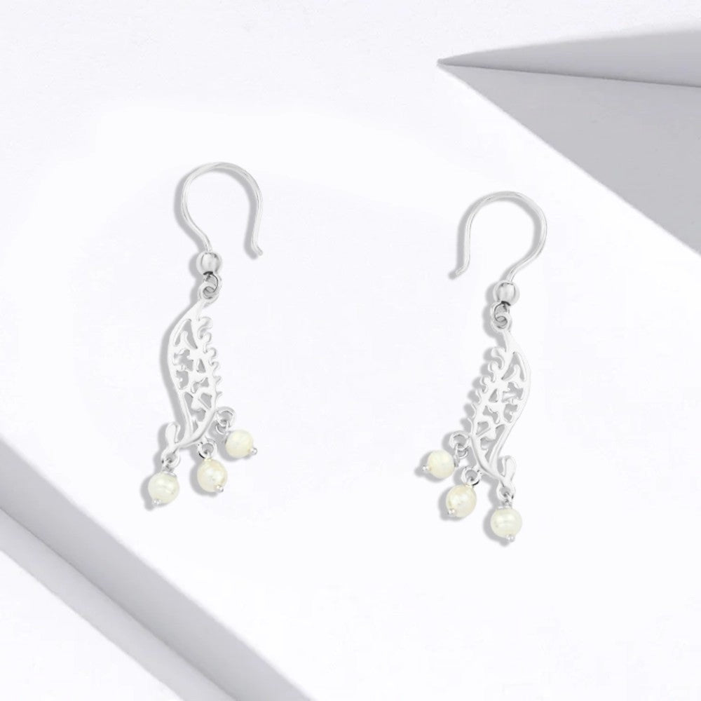 Silver hoop with an Arabic hollow design
