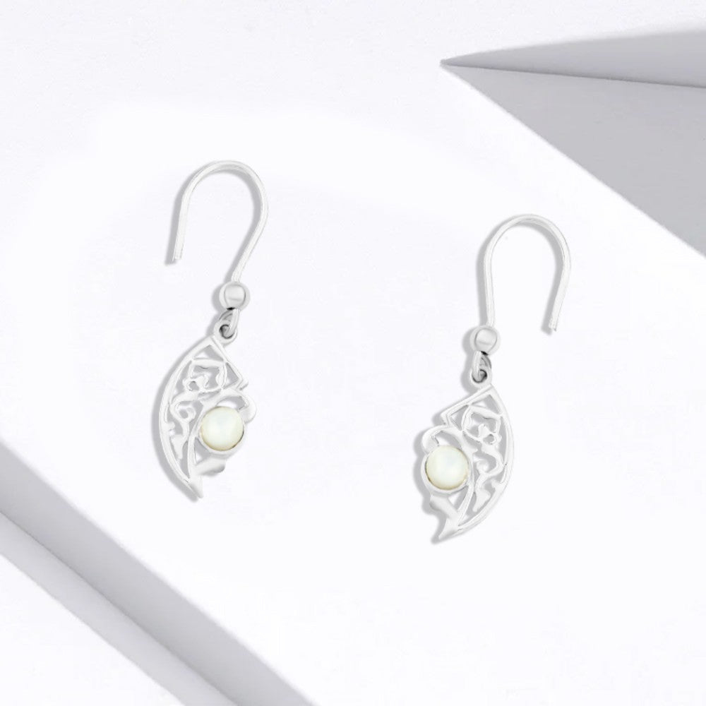 Silver hoop with an Arabic hollow design