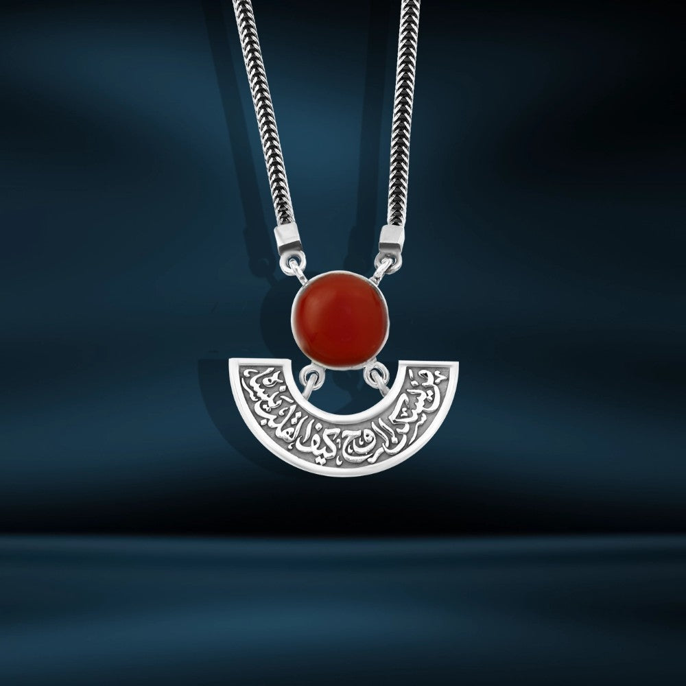 Silver necklace with an Arabic design (He who lives in the soul, how can the heart forget him?) (Your presence is the paradise of this world)