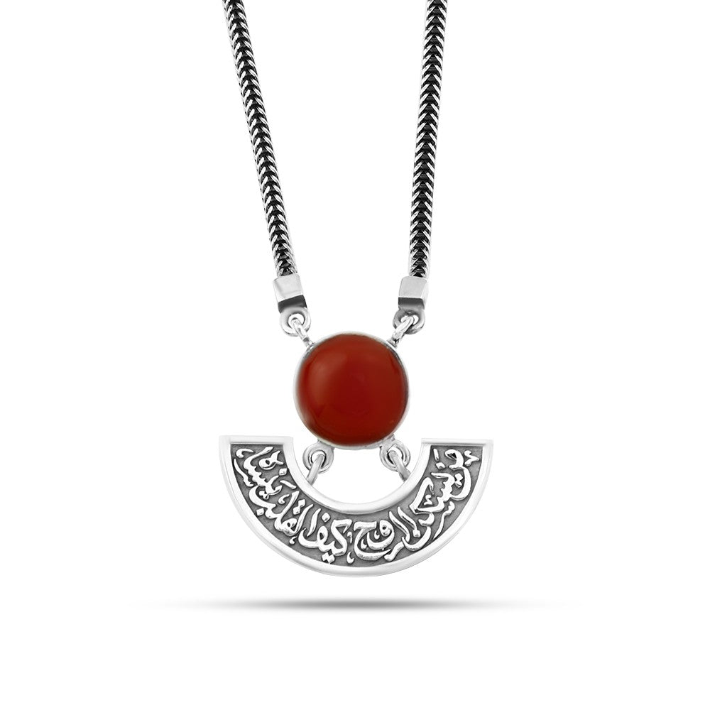 Silver necklace with an Arabic design (He who lives in the soul, how can the heart forget him?) (Your presence is the paradise of this world)