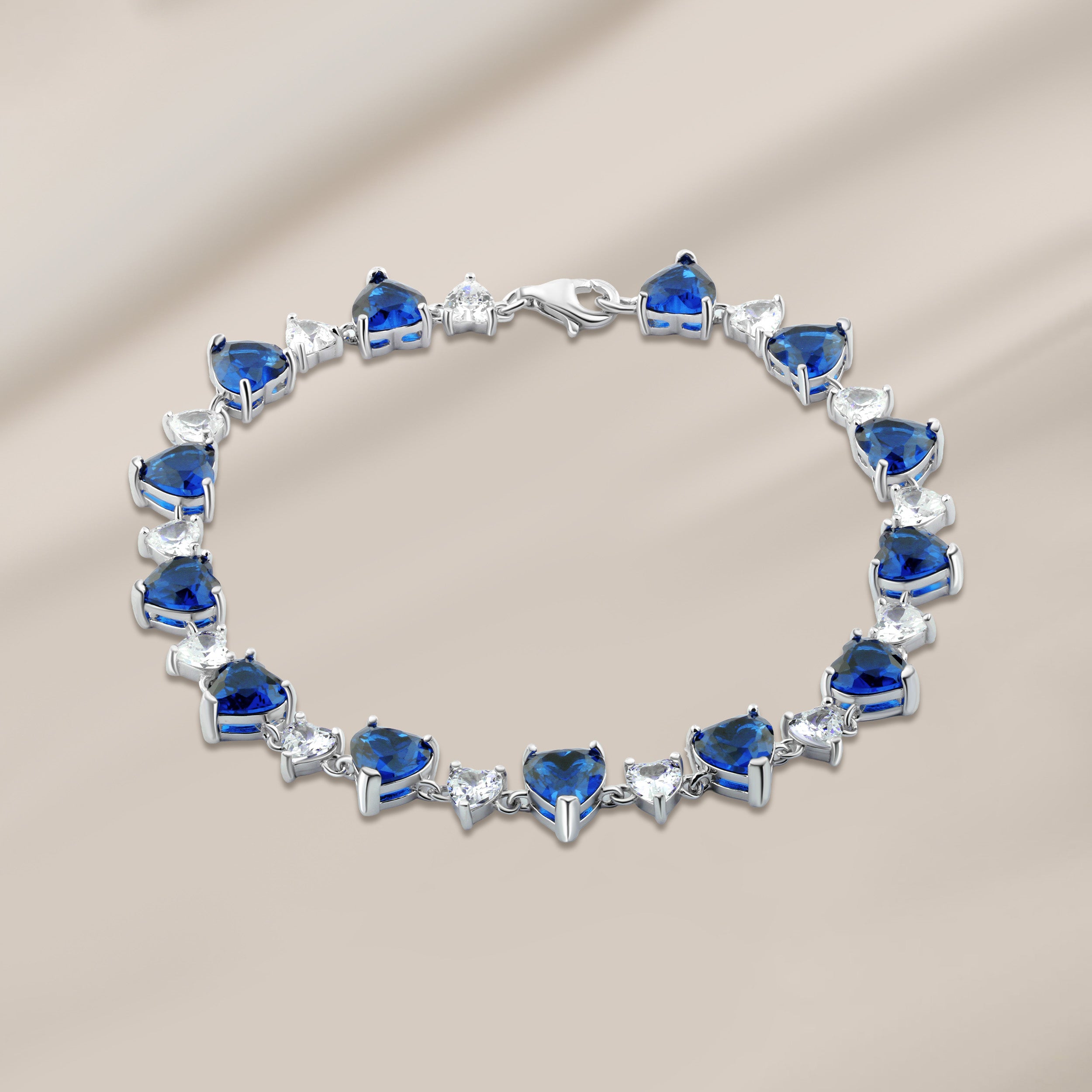 إنسيال قلوب زركون أزرق – فضة عيار 925