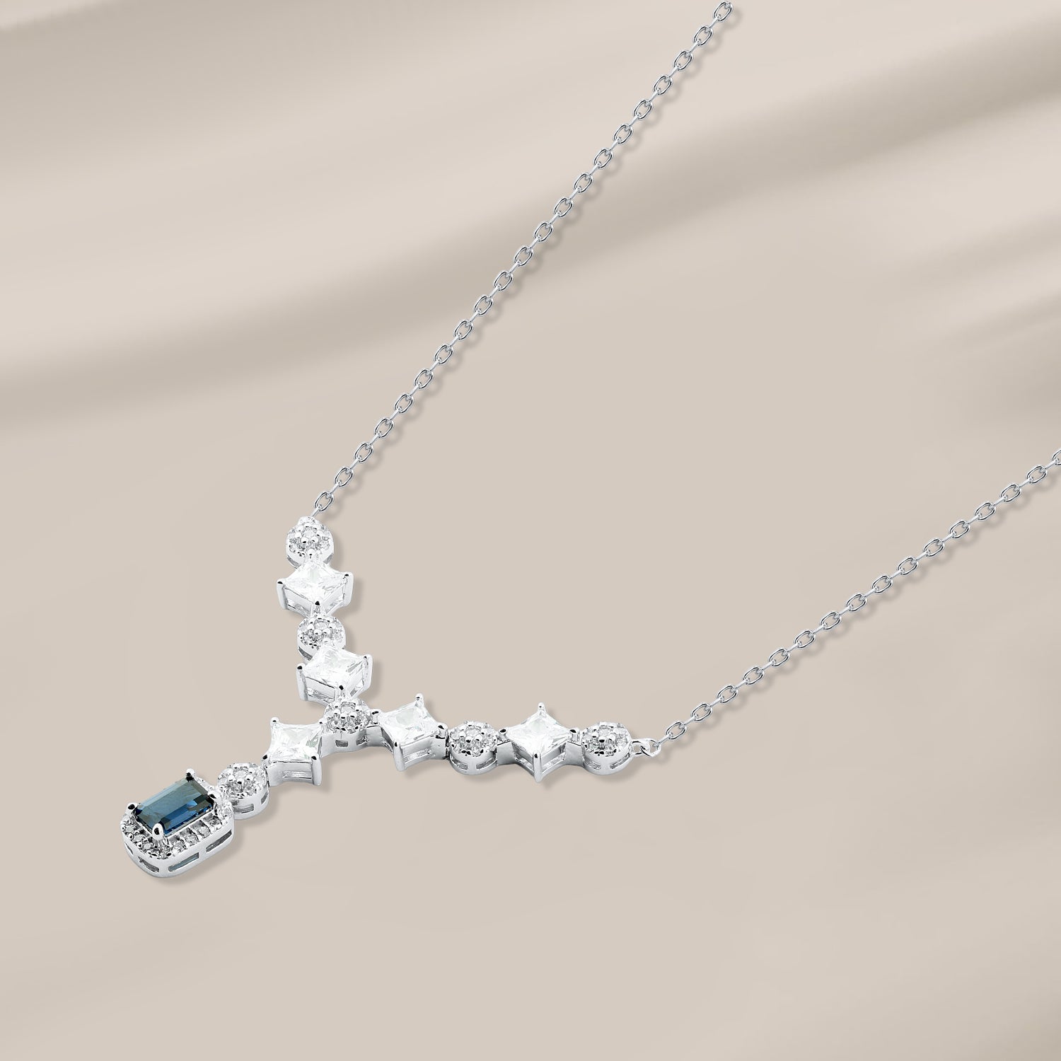 Luxury 925 silver necklace with a rectangular blue stone and sparkling accents