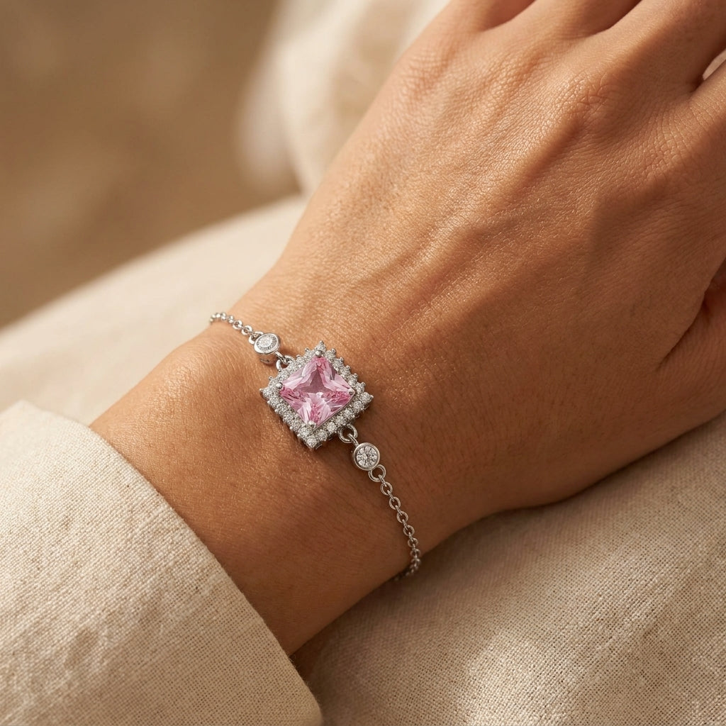 925 Silver Square Bracelet With A Pink Stone Surrounded By Sparkling Stones.