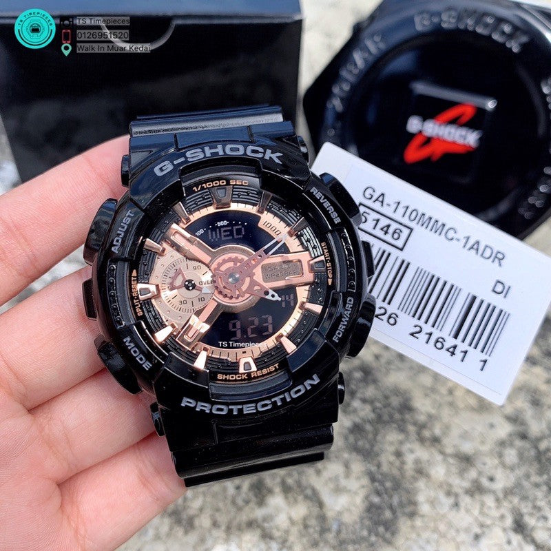 GA-110MMC-1ADR – ساعة كاسيو جي شوك كرونوغراف رقمية وتناظرية للرجال بسوار رزين وهيكل أسود ولمسات ذهبي وردي
