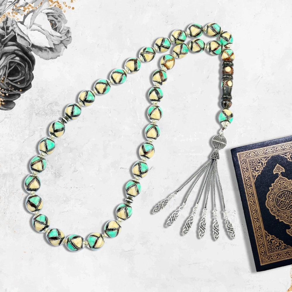 Rosary made of coke inlaid with silver, natural ivory and turquoise, 33 beads