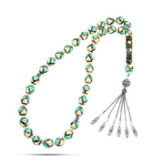 Rosary made of coke inlaid with silver, natural ivory and turquoise, 33 beads