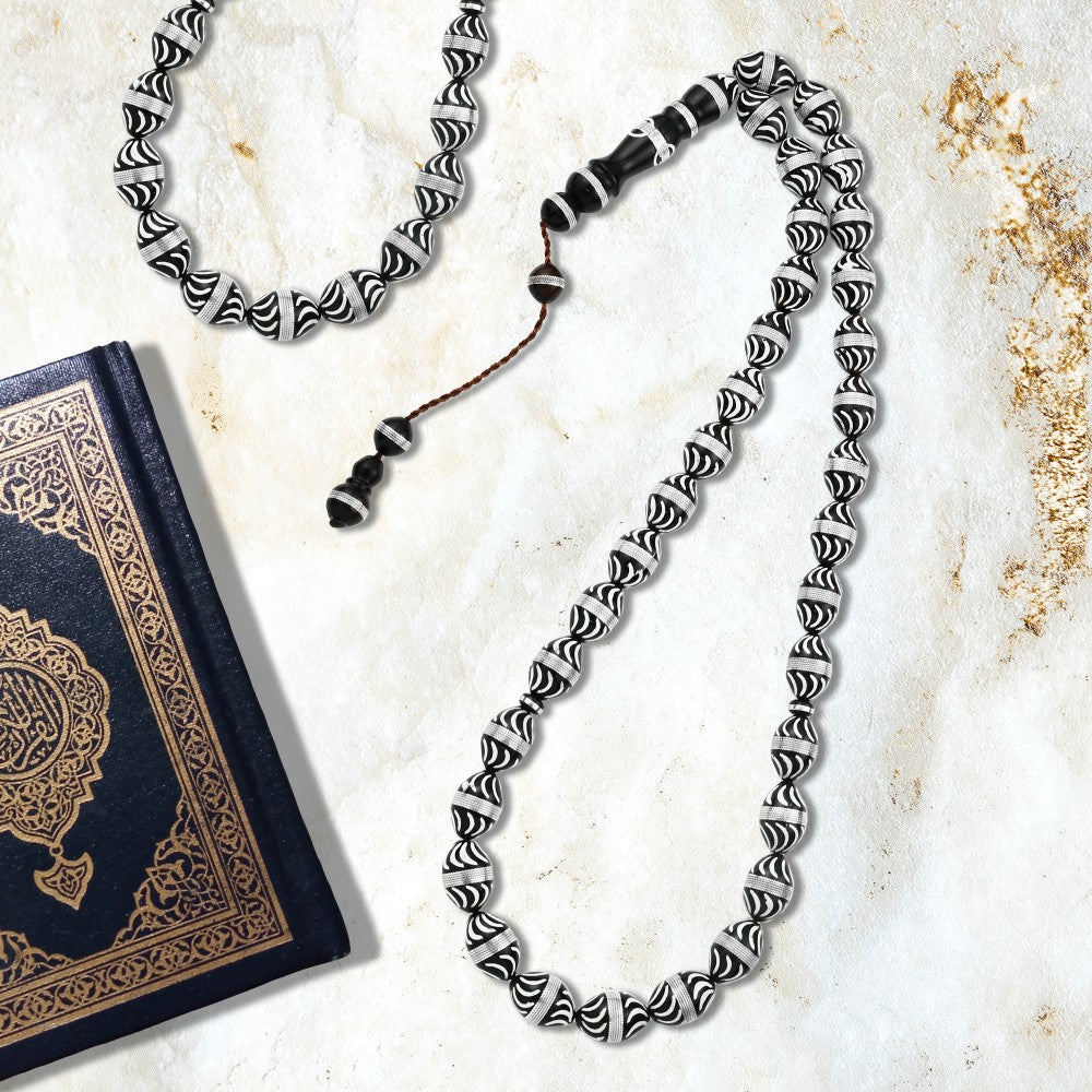 Rosary made of fine coke inlaid with silver, 33 beads