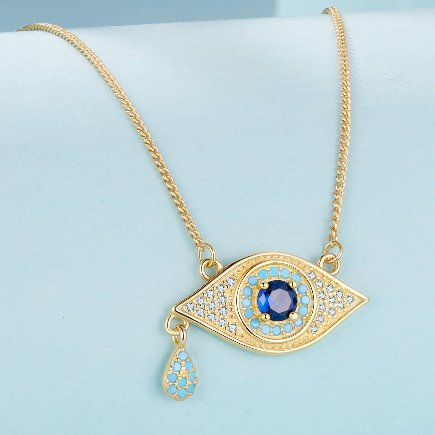 عقد العين بحجر أزرق دائري ولمسات فيروزية فضة 925 مطلي ذهب