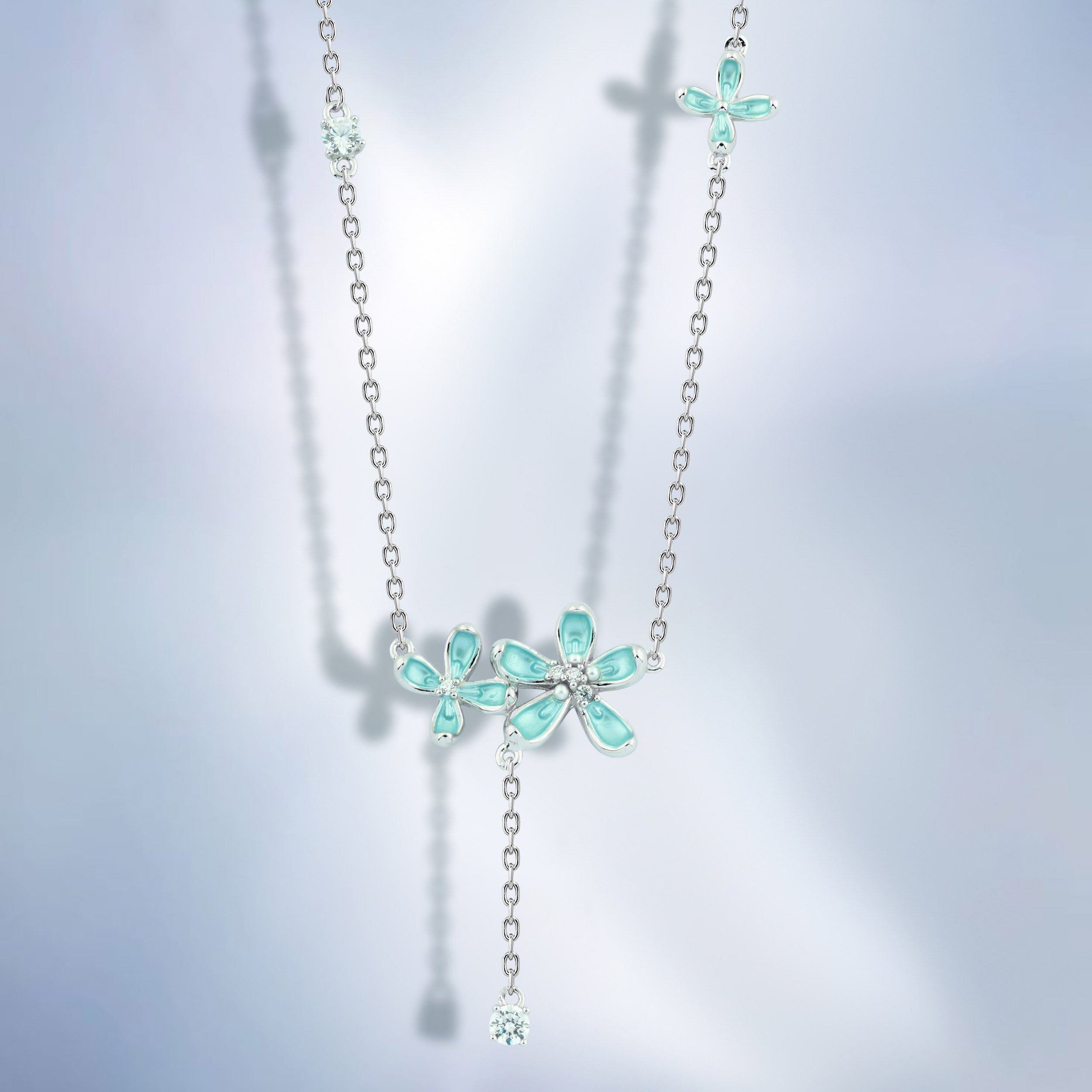 عقد "زهور تركواز متدلية بفصوص لامعة" فضة عيار 925