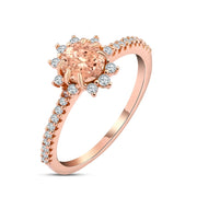 925 sterling silver ring topped with a sun-shaped nano morganite stone
