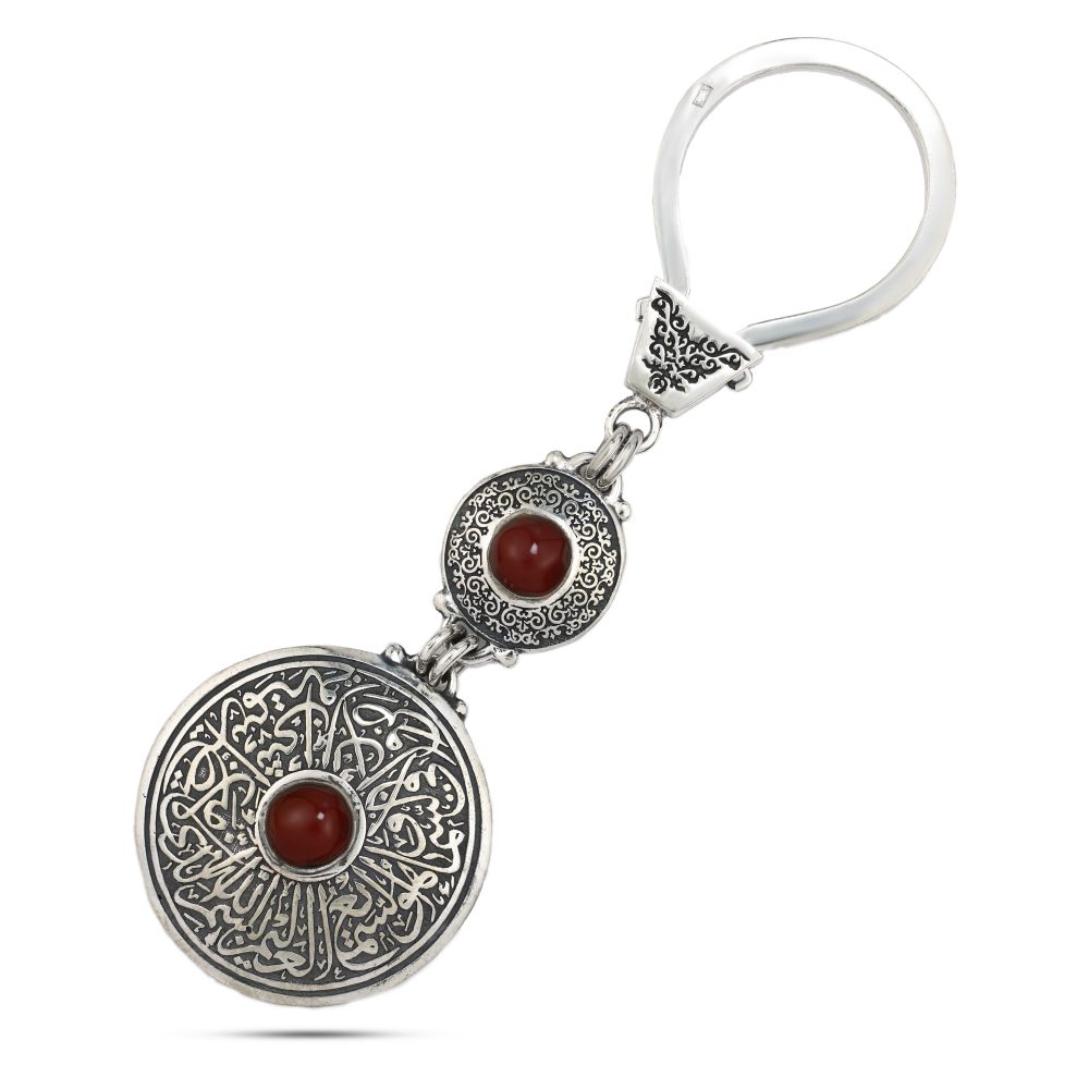 Egyptian silver key medallion (In the name of God, with whose name nothing on earth or in heaven can harm, and He is the All-Hearing, the All-Knowing)