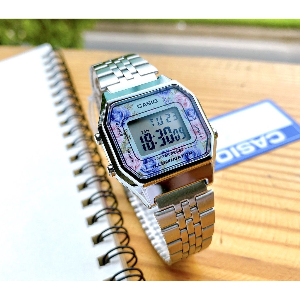 LA680WA-2CDF – Stylish Casio Digital Watch with Silver Metal Strap and Distinctive Pink Design