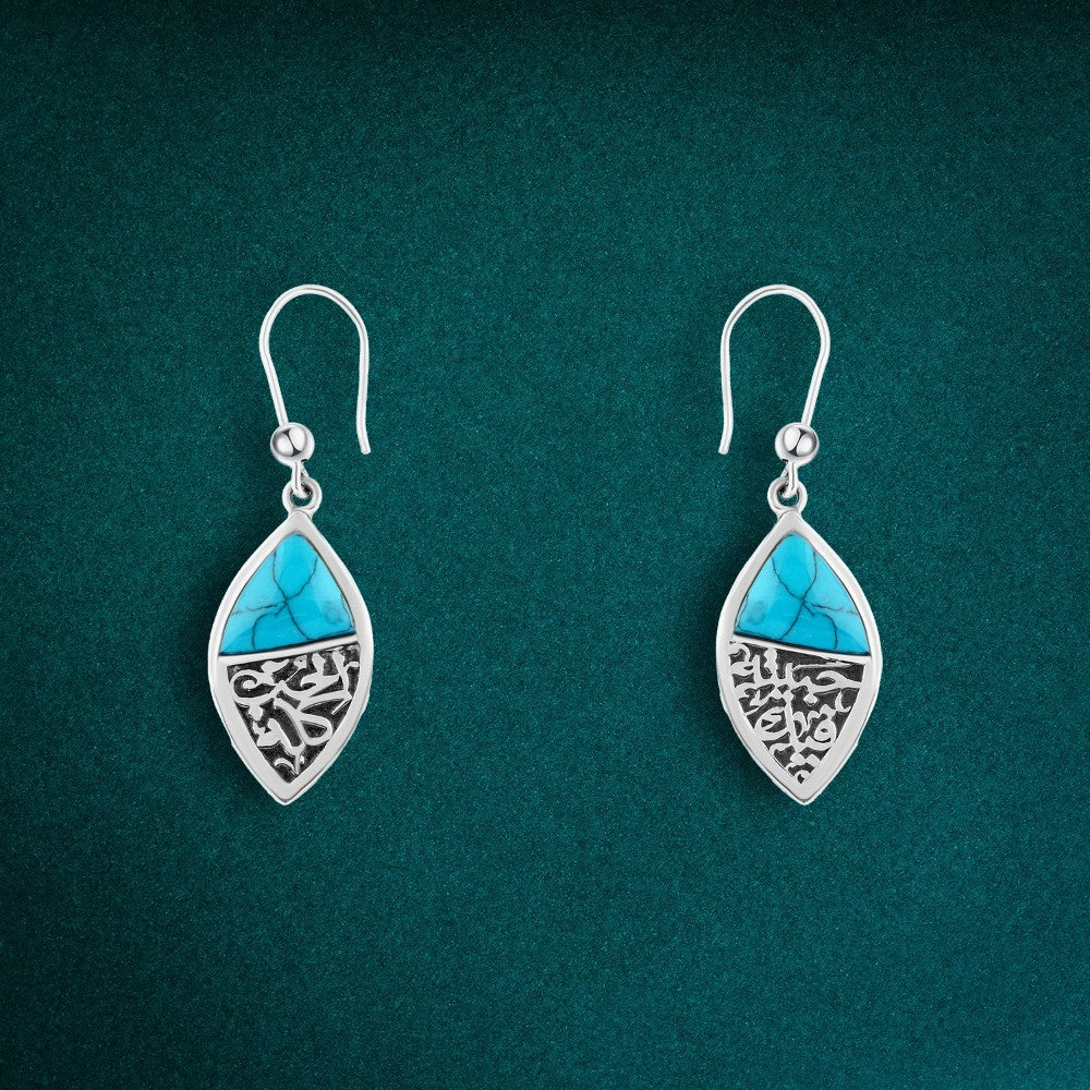 Elegant 925 silver earrings adorned with a natural turquoise stone and Arabic engraving.