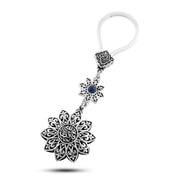 ميدالية "زهرة النقوش العربية بحجر لابس أزرق" فضة عيار 800