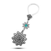 ميدالية "زهرة النقوش العربية بحجر فيروز" فضة عيار 800