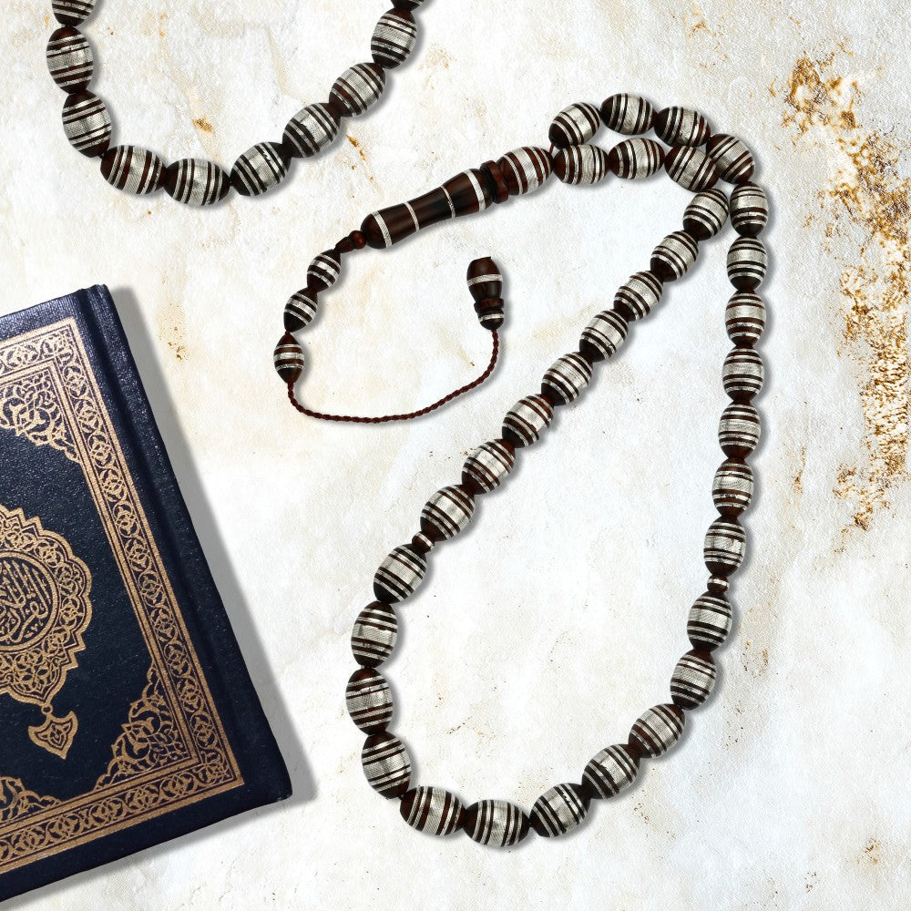 Rosary made of fine coke inlaid with silver, 33 beads