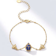925 Silver Ancient Egyptian Scarab Bracelet with Blue Stone & Lotus Flower – Gold Plated