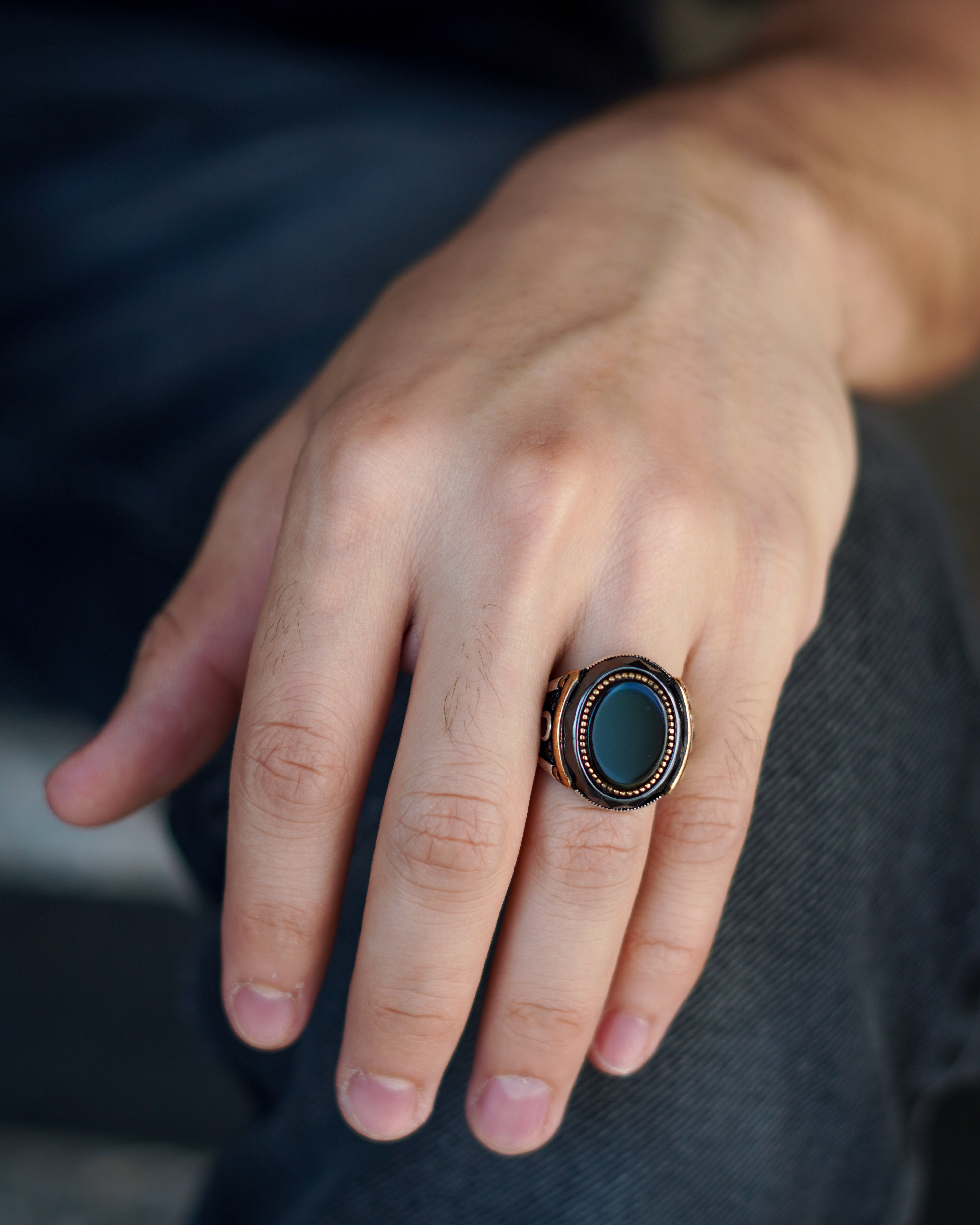 Men's Silver Ring with Natural Black Onyx and Golden Decorative Accents

