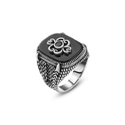 Men’s Silver Ring with Black Onyx and Raised Silver Pattern