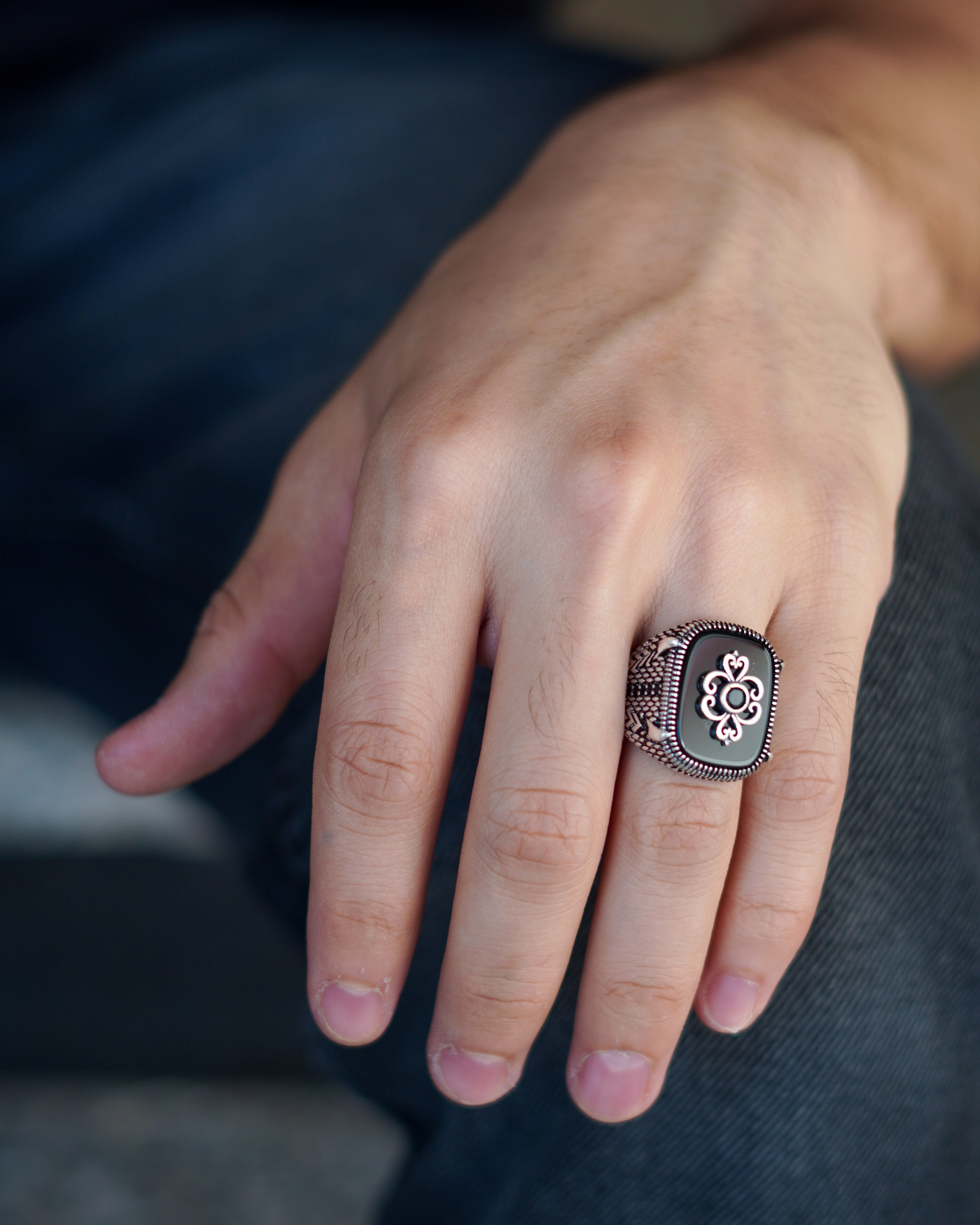 Men’s Silver Ring with Black Onyx and Raised Silver Pattern
