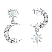 925 silver hoop earrings with a crescent moon design and dangling star
