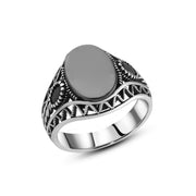 Men’s Silver Ring with Oval Black Stone and Carved Side Patterns